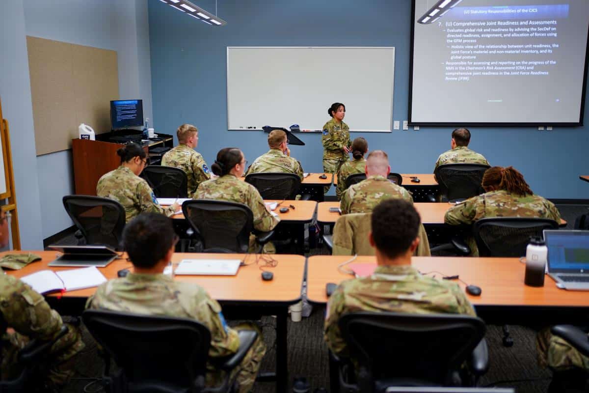 Instructor leading a classroom of students