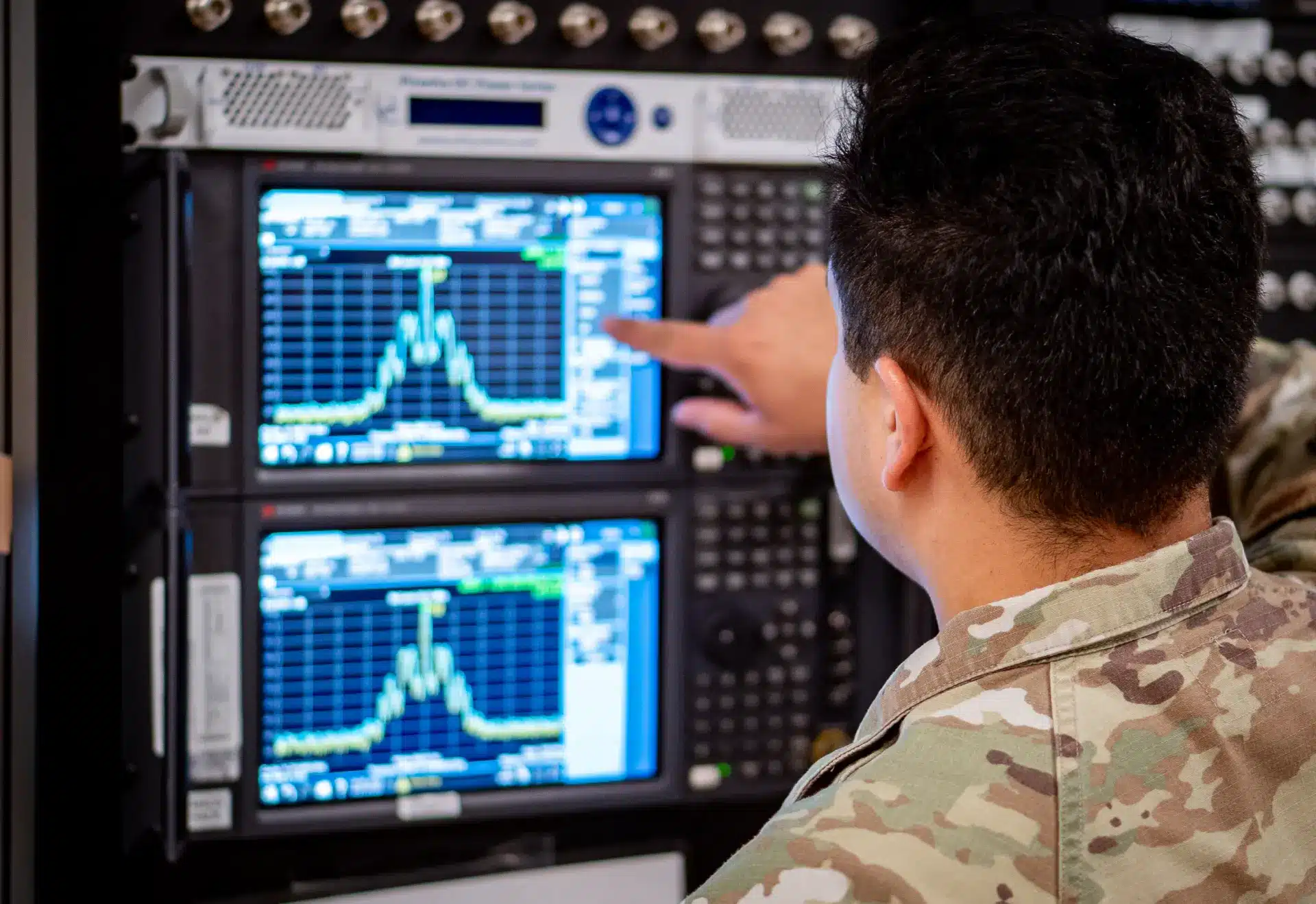 Analyst reviewing operational data and system performance metrics.